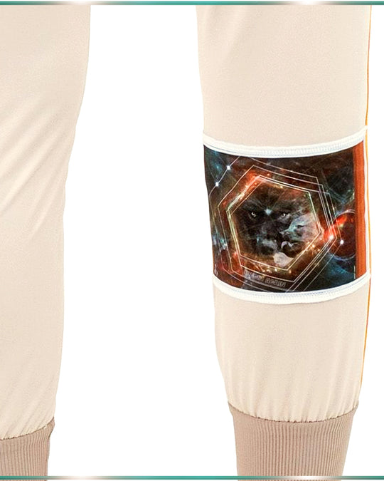 Close up of the right back leg of the tan, color blocking lounge pants and it's artwork of a black wolf