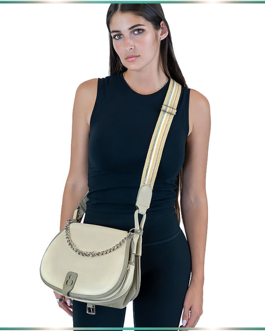 A model facing forward wearing our bag crossbody.