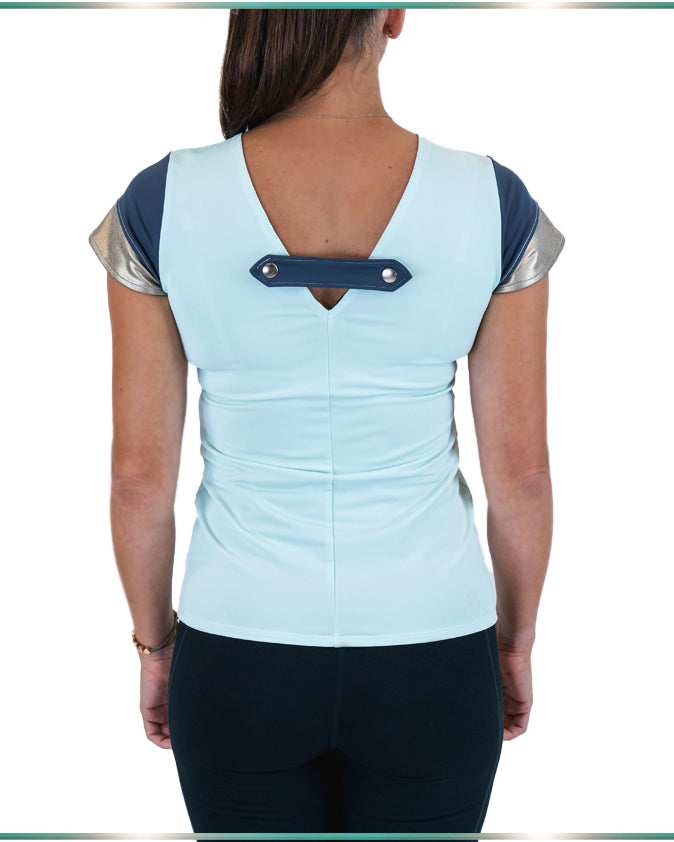 A model wearing a light blue ObiNuru T-shirt facing back showing the color blocking sleeves from the back and the back drop with the closure.